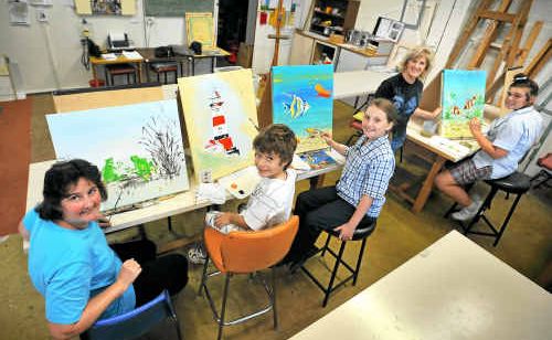 Artist Maggie Haynes (second right) and some of her art students. Artist Maggie Haynes (second right) and some of her art students.
